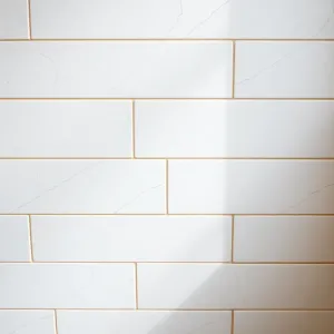 Czy można kłaść płytki na płytki na ścianie