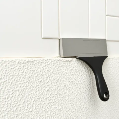 Czy na tynk mozaikowy można kłaść płytki