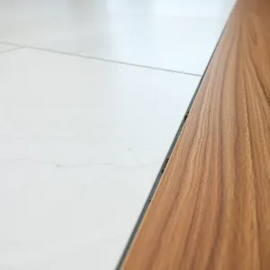 Jaka dylatacja między płytkami a panelami