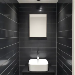 Mała łazienka ciemne płytki