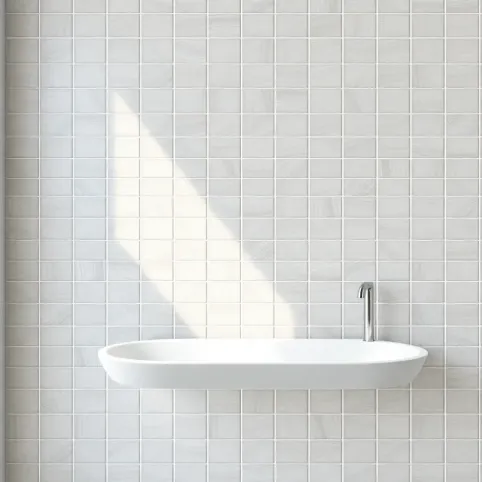 Płytki w jodełkę na ścianie łazienka