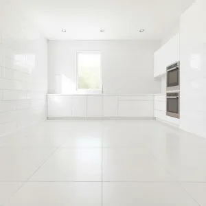 Takie same płytki na ścianie i podłodze w kuchni