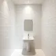 Płytki w małej łazience pionowo czy poziomo